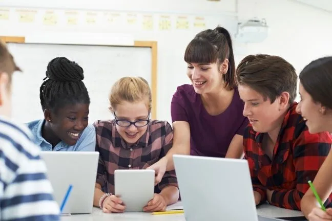 Middle school students and teacher