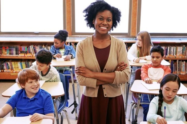 Main image furman article teacher in classroom