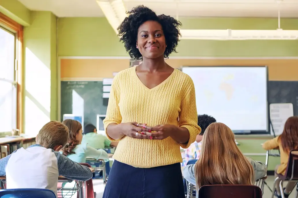 Teacher yellow sweater commitments